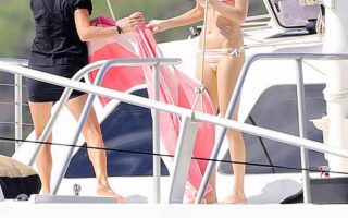 Taylor Swift in a Striped Vibrant Bikini Makes a Splash in Maui