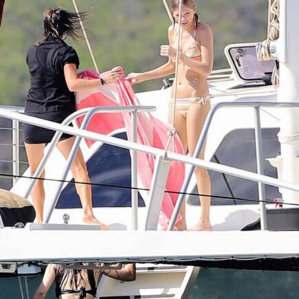 Taylor Swift in a Striped Vibrant Bikini Makes a Splash in Maui