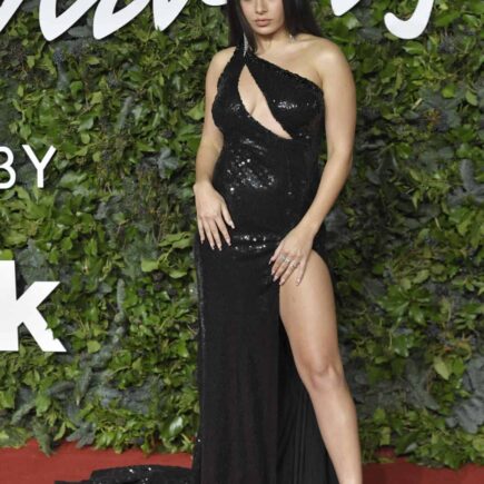 Charli XCX Stuns in One-shoulder Black Dress at Fashion Awards 2021