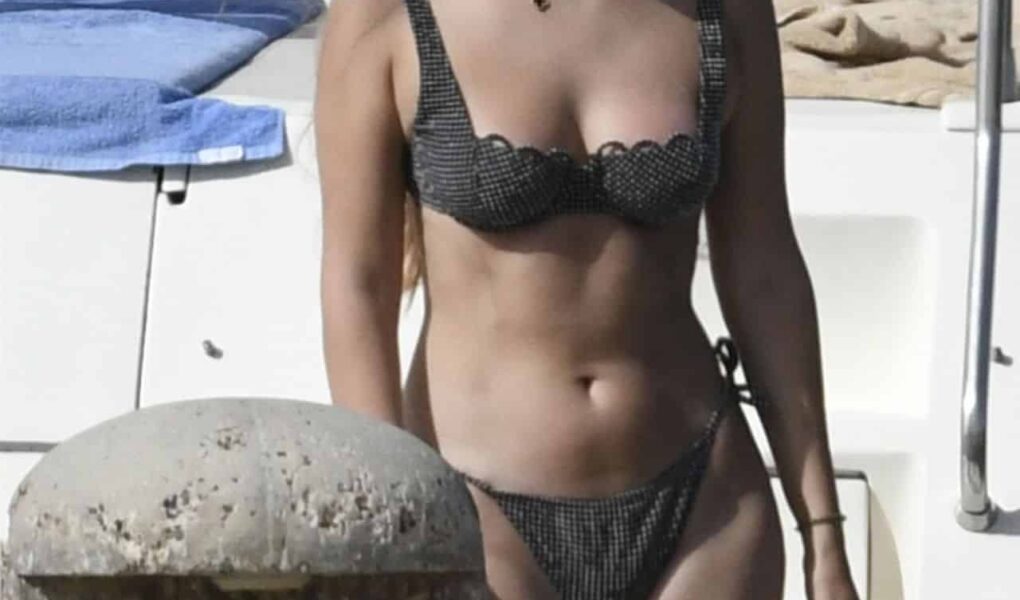Millie Bobby Brown Flaunts her Figure in a Chic Dark Bikini in Sardinia