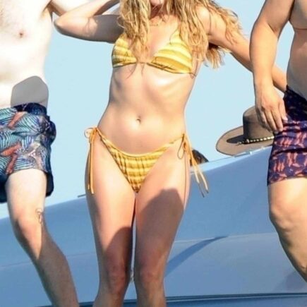 Margot Robbie is Having a Great Time in a Yellow Bikini on a Yacht in Spain