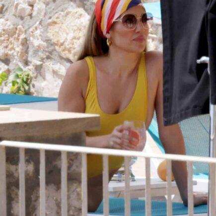 Jennifer Lopez Wore a Showy Yellow Swimsuit During a Photoshoot in Capri