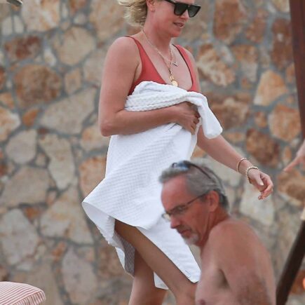 Charlize Theron Looked Amazing in a Red Swimsuit in Cabo San Lucas