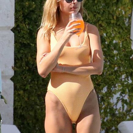 Kimberley Garner in an Orange Swimsuit Enjoying in Miami Sun