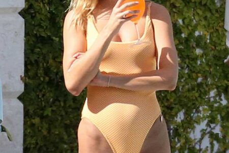 Kimberley Garner in an Orange Swimsuit Enjoying in Miami Sun