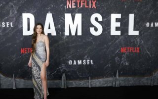 Millie Bobby Brown Radiates in Silver Gown at “Damsel” Premiere