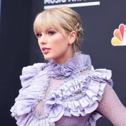 Taylor Swift Dazzles at the Billboard Awards in Lilac Ruffled Mini Dress