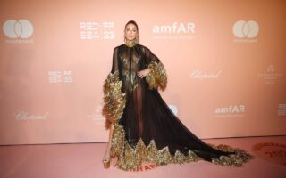Kate Beckinsale Serves Gold and Black Elegance at amfAR Gala Venezia