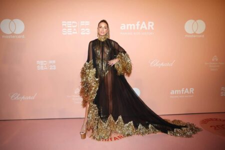 Kate Beckinsale Serves Gold and Black Elegance at amfAR Gala Venezia