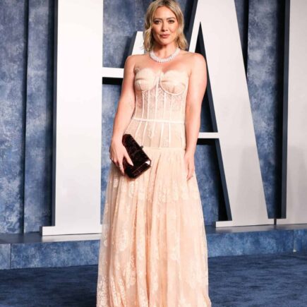 Hilary Duff Stuns in a Peach Gown at the 2023 Vanity Fair Oscars Party