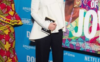Emma Watson is Chic in a Blouse and Pants at the “City of Joy” Premiere