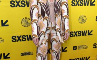 Dakota Johnson in a Chic Gucci Pantsuit at the Cha Cha Real Smooth Premiere