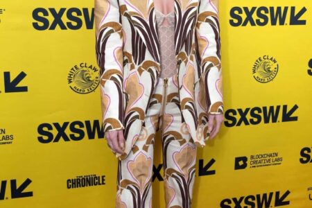 Dakota Johnson in a Chic Gucci Pantsuit at the Cha Cha Real Smooth Premiere