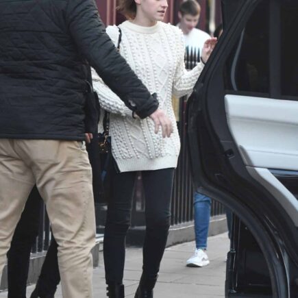 Emma Watson Looks Fantastic in a White Knitted Sweater and Black Jeans