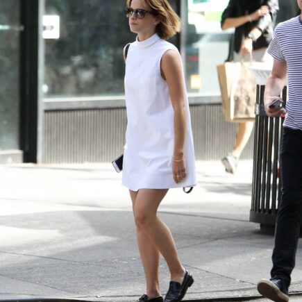 Emma Watson Shows Her Legs in a White Mini Dress as she Tours Shoe Stores