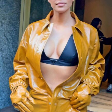 Kim Kardashian Shows Off her Bust in PVC Coveralls at Milan Fashion Week