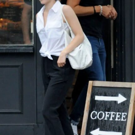 Emma Watson Looks Chic in a Sheer White Shirt at the Coffee Shop in London