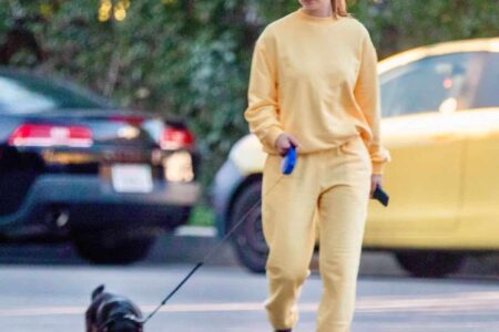 Lily James Goes Out in a Yellow Sweatsuit to Walk her Boyfriend’s Dog in LA