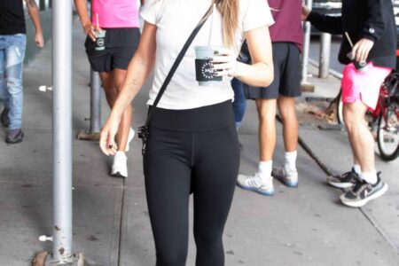 Olivia Wilde Smiles Happily as she Walks with Harry Styles in NYC