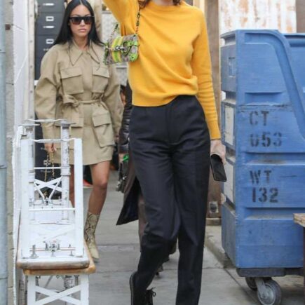 Kendall Jenner in a Black Pants & Yellow Sweater Out in Venice