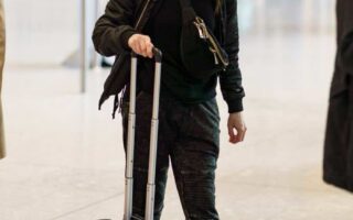 Anna Kendrick at Heathrow Airport in London