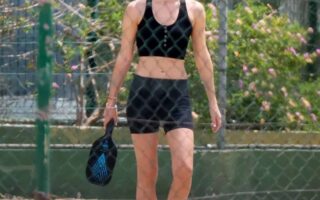 Emma Watson Plays the Padel in a Black Sports Bra and Matching Shorts