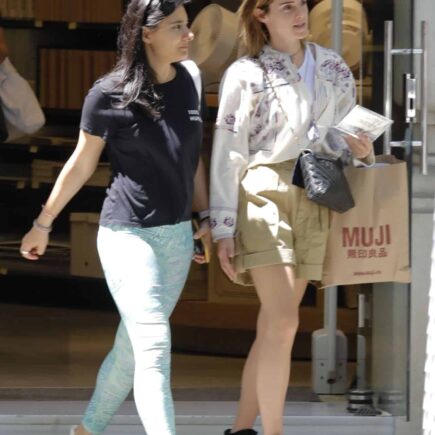 Emma Watson Flaunts Toned Legs in Khaki Shorts while Shopping in Barcelona