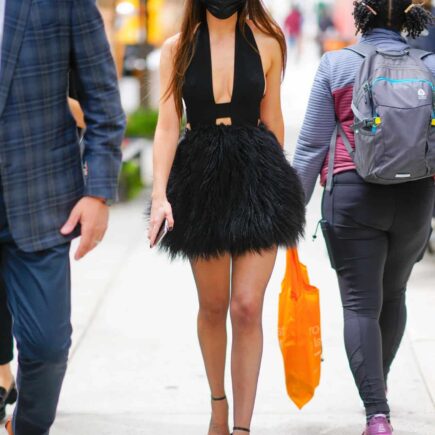 Dakota Johnson Out in a Little Black Feathered Dress in New York