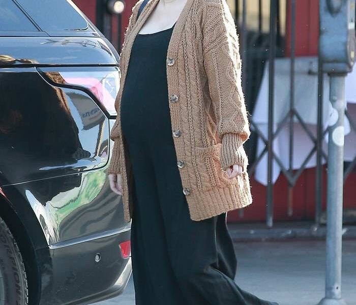 Emma Roberts in a Black Jumpsuit Stops by a Coffee Shop in Los Feliz