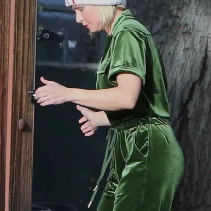 Kristen Bell Dressed for the Holidays in Green Overalls and a Santa Hat in LA
