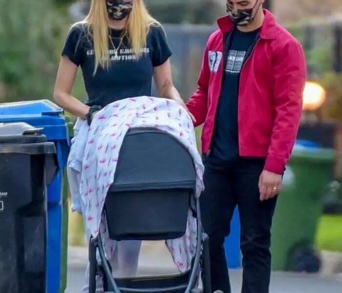 Sophie Turner And Joe Jonas Walk With Their Baby Girl Around Their Neighborhood