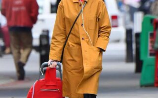 Naomi Watts Looks Stylish in a Yellow Coat while Shopping in Tribeca