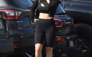 Charli XCX Flashes Her Toned Midriff in a Sports Outfit as She Leaves LA Gym