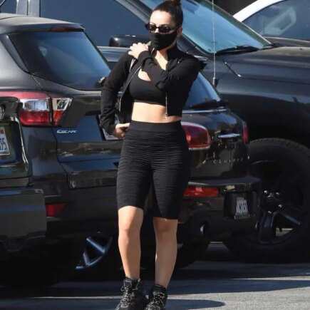 Charli XCX Flashes Her Toned Midriff in a Sports Outfit as She Leaves LA Gym