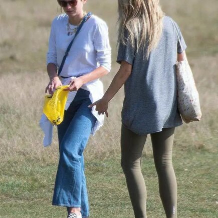 Emma Corrin Enjoying a Dog Walk with a Friend in London