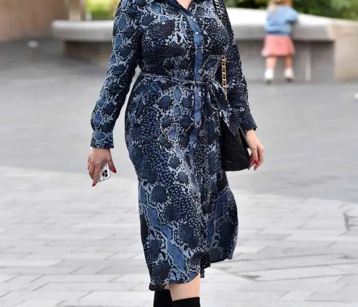 Kelly Brook Looked Effortlessly Chic in a Blue Snakeskin Print Midi Dress