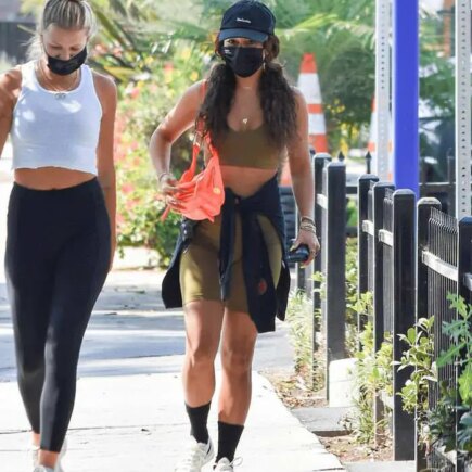 Vanessa Hudgens Displays her Toned Body in a Green Bra and Biker Shorts