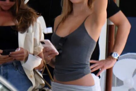 Kimberley Garner Shows Off Her Toned Legs in Tiny Gray Shorts