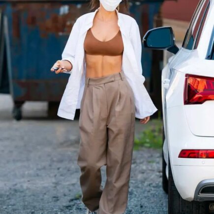 Emily Ratajkowski Reveals Her Toned Abs in a White Shirt and Bra Top