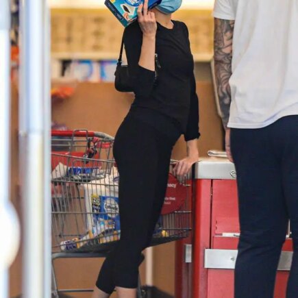 Charlotte McKinney in a Black Outfit During a Masked Pharmacy Run