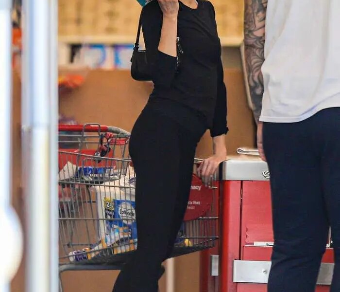 Charlotte McKinney in a Black Outfit During a Masked Pharmacy Run
