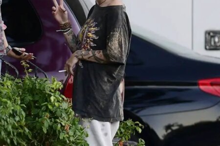 Paris Jackson in a Peace Sign T-shirt as she Smokes with Friends