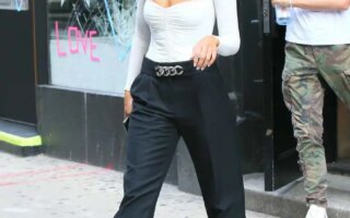 Dua Lipa in a Chic White Cut-out Bodysuit Leaves a Studio in NY