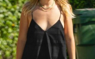 Margot Robbie Steps Out in a Stunning Black Mini-dress in LA