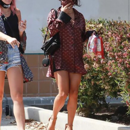 Vanessa Hudgens in a Short Shirt Dress and Sky-high Platform Heels