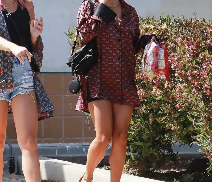 Vanessa Hudgens in a Short Shirt Dress and Sky-high Platform Heels