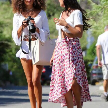 Jessica Aidi in a Ruffled White Crop Top and White Mini Skirt