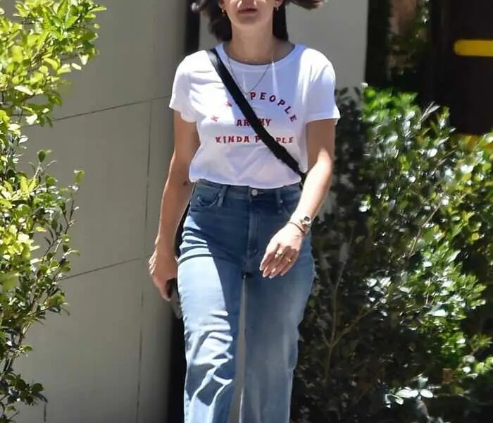 Lucy Hale in a Chic White T-shirt and Wide-leg Jeans