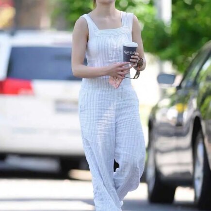 Joey King Looks Chic in White and Blue Linen Overalls