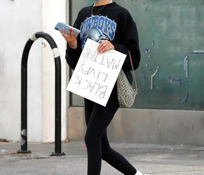 Madison Beer Carries a Handmade “Black Lives Matter” Sign